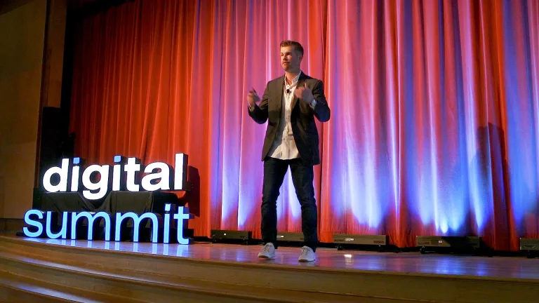 Garrett Mehrguth speaking at Digital Summit in Salt Lake City.
